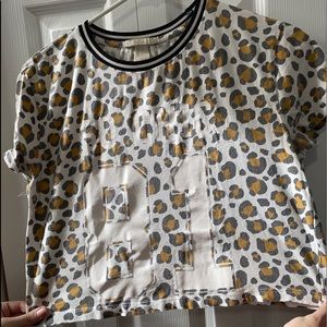 Two cropped graphic tees